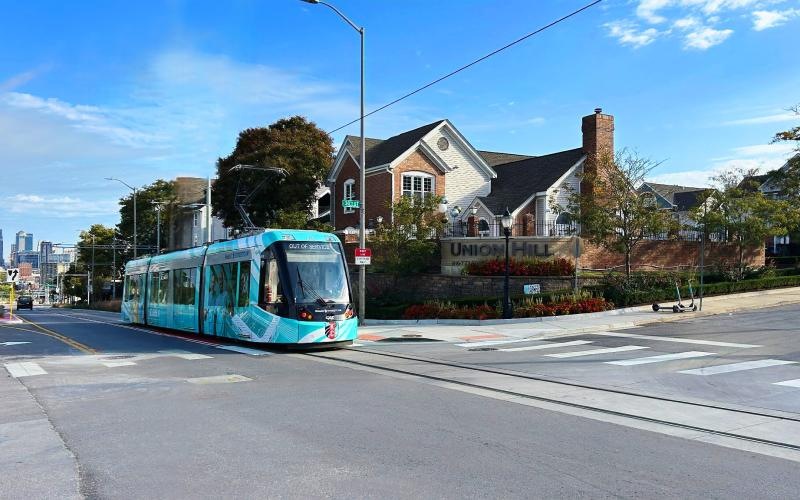 a bus driving down a street